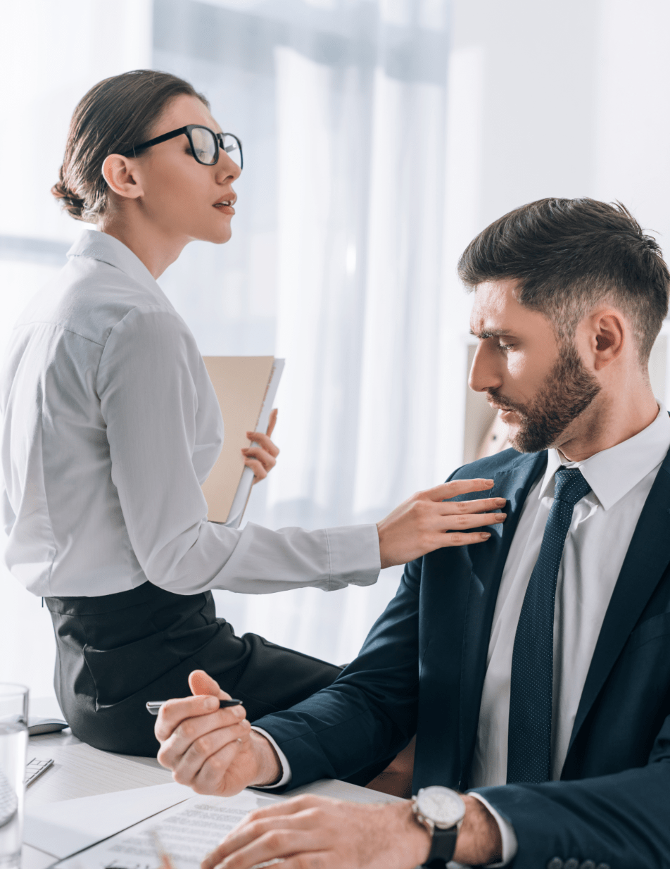Man receiving unwanted sexual advances in the workplace.