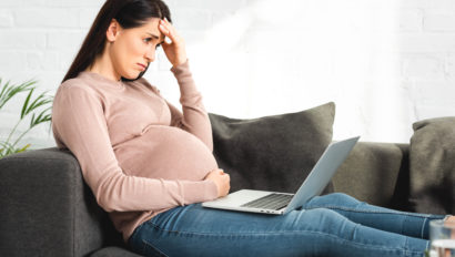 Pregnant woman under stress from employer.