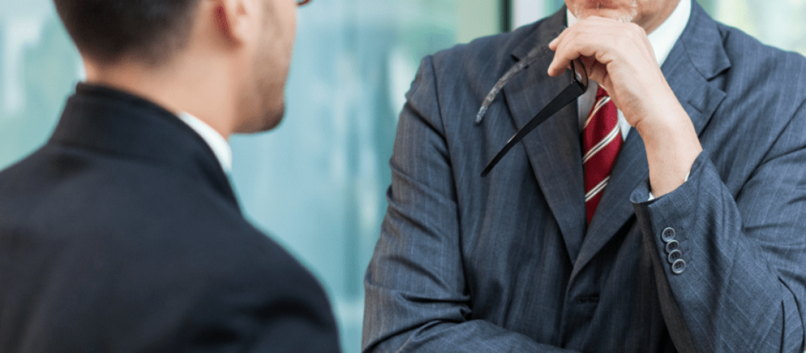 Two men discussing the constructive dismissal of an employee.